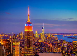 City skyline orange blue night - american scene painting free wallpaper