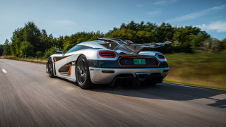 White sports car driving forest 6 - andrew law free wallpaper