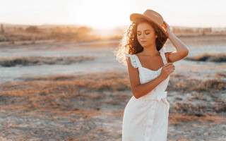 Woman white dress hat sunset 2 - free beach wallpaper