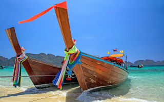 Boats beach sky water fishing - a couple of boats free wallpaper