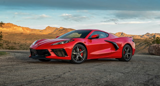 Red sports car mountain cloudy - a cloudy sky in the background free wallpaper