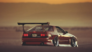 Red car surfboard roof parking - roof free wallpaper
