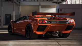 Orange sports car garage surfboard - a surfboard free wallpaper