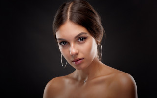 Woman hoop earrings black background - portrait photography free wallpaper for desktop