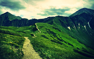 Lush green mountain path cloudy - a path free wallpaper
