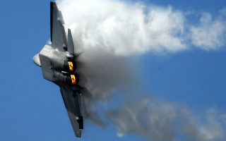 Jet fighter blue sky clouds - a jet free wallpaper