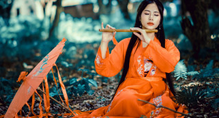 Woman orange dress flute forest - a flute free wallpaper