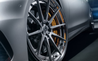 Car wheel closeup blue background - rim free wallpaper
