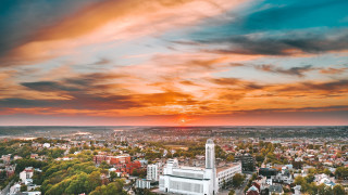 City sunset cloudy sky building - a sunset in the background free wallpaper