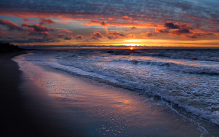 Sunset ocean waves beach person 7 - the beach in the distance free wallpaper