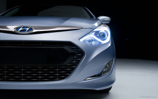 Car closeup headlight black background - aimitsu free wallpaper