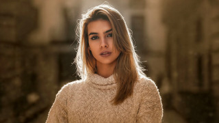 Woman longhair sweater hallway bokeh - long hair and a sweater free wallpaper