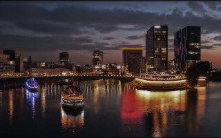 Boat bridge city night clouds - a cloudy sky above free wallpaper for desktop