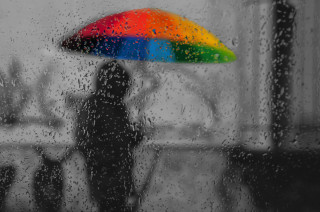 Rainy urban scene rainbow umbrella - outside free wallpaper