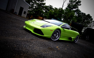 Lime green sports car driveway - a house and trees free wallpaper