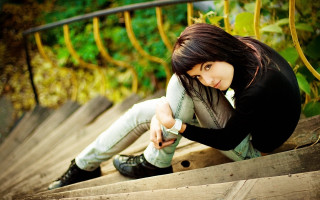 Woman sitting stairs phone hand - a set of stairs free wallpaper