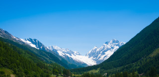 Mountain range valley forest snow - a matte painting free wallpaper