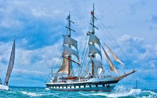 Large sailboat ocean cloudy day - lyco art free wallpaper