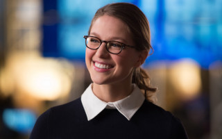Woman glasses black sweater smiles - a black sweater free wallpaper