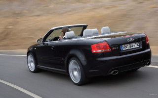 Black convertible car road hillside - a road next free wallpaper