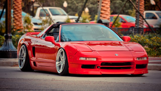 Red sports car parking lot 21 - the side of the road in front free wallpaper