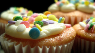 Cupcake white frosting sprinkles closeup - clara peeters free wallpaper