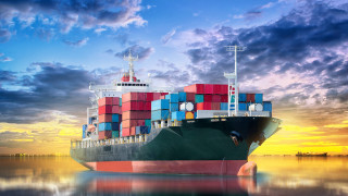 Cargo ship containers sunset mountain 2 - photorealistic imagery free wallpaper