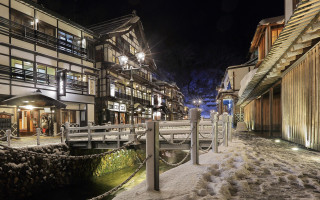 Snowy street bridge buildings night - a snowy street free wallpaper