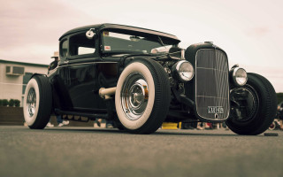 Black car white rim chrome 2 - the background and a building in the background free wallpaper