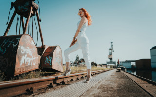 Woman white traintrack watertower crane - near free wallpaper
