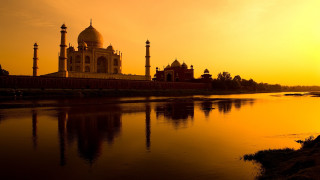 Large building river bridge tall - top of a river next free wallpaper