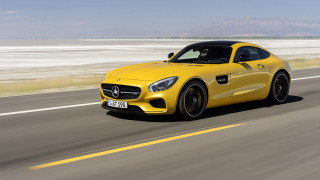 Yellow mercedes sports car ocean - a sky background free wallpaper for desktop