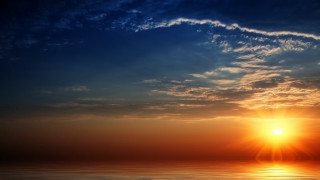 Sunset clouds bright sun reflection - a sunset free wallpaper