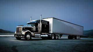 Semi truck parked road mountains - a semi truck free wallpaper