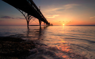 Pier sunset water bridge citylights - dave allsop free wallpaper