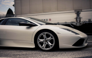 White sports car parking lot 34 - a large window free wallpaper