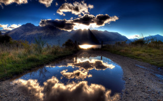 Road water clouds sunrays reflective - cloud and sun rays free wallpaper