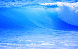 Ocean wave foamy sky beach - a blue sky background free wallpaper