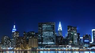 City skyline night reflection lights - the building and the water free wallpaper
