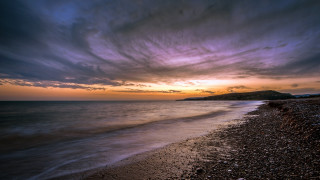 Beach sunset cloudy sky hill - impressionist free wallpaper