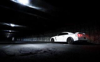 White sports car tunnel lit - a dark tunnel free wallpaper