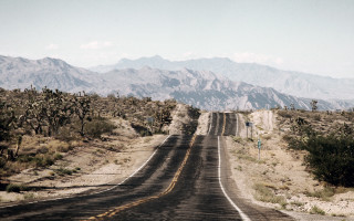Long road mountain range sign - a long road free wallpaper