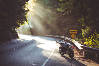 Motorcycle forest road sign night - the side of the road free wallpaper