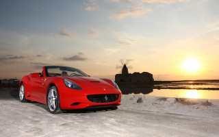 Red sports car windmill sunset - a windmill free wallpaper