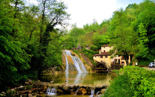 Waterfall forest truck house nature - a waterfall in a forest free wallpaper