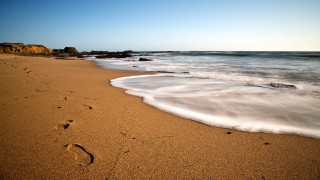 Beach waves footprints rock outcropping 2 - australian tonalism free wallpaper
