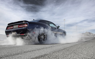 Black car smoke mountains tilt - tire free wallpaper