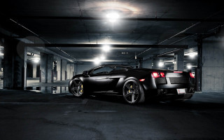 Black sports car parking garage 9 - a parking garage free wallpaper