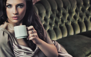 Woman coffee couch serious fashion - a couch holding free wallpaper