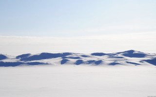 Skiing person mountain sky clouds - ambient occlusion free wallpaper